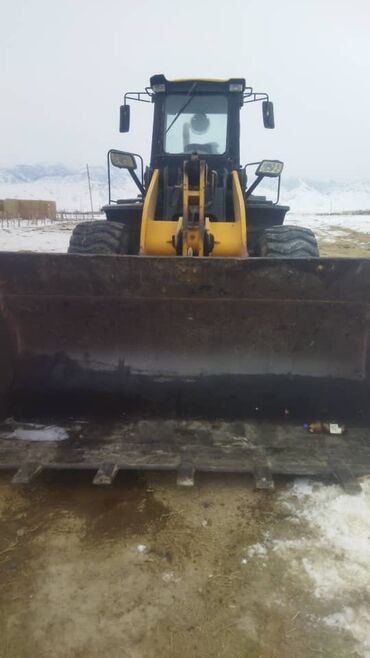 Погрузчики: Погрузчик, 2012 г., Колесный, Фронтальный — 10