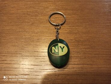 new york kacketi: Mali, lep privezak NEW YORK original sa zelenom LED lampicom