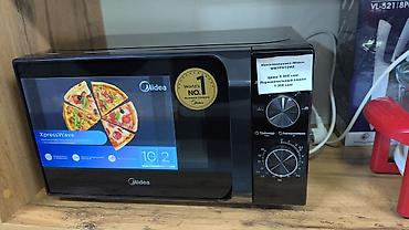 Микроволновые печи для кухни — несколько моделей на выбор 1) Midea