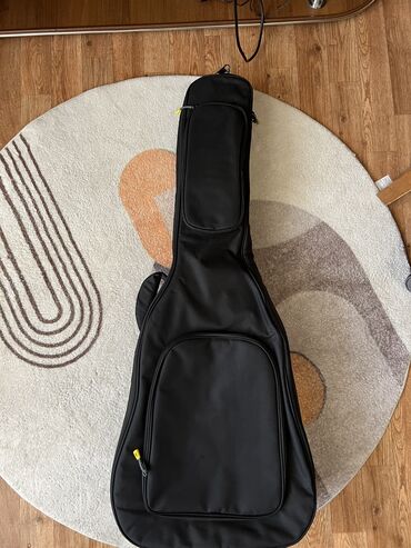 Другие комплектующие: **🎸 Продажа новых чехлов для гитар! 🎸** - **Серый чехол** — 1000