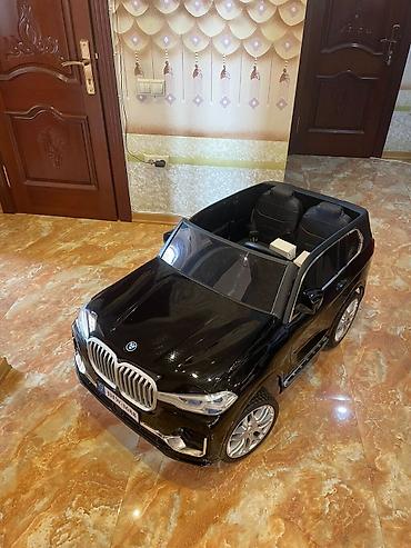 Uşaq üçün elektrik maşınları: Dilek BMW X5.Masin satilir 350 azn Evde sürülüb. Problemsizdir.50 kq — 6