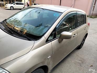 vectra stop: Nissan Tiida – hetçbek - Kuzov: 5 qapılı hetçbek, qızılı rəng - — 3