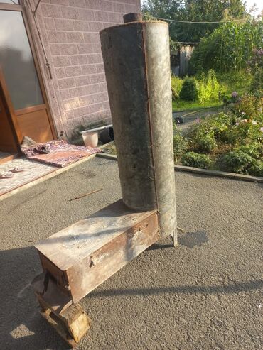 soyuducu 2 əl: Metal soba, istilik tələbatını ödəmək üçün nəzərdə tutulmuşdur