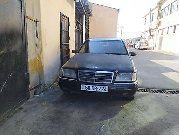 mercedes benz e250: Mercedes-Benz C180 sedan - Korpus: 4 qapılı sedan, qara rəng - Kuzov — 2