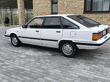 mini gps tracker: Toyota Camry: 1984 г., 2 л, Автомат, Бензин — 6