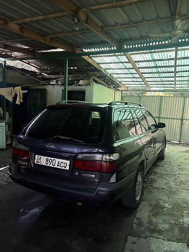 форт бензин: Mazda Capella: 1998 г., 2 л, Механика, Бензин, Универсал — 1