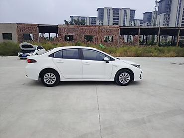 golf 1: Toyota Corolla: 2021 г., 1.8 л, Гибрид, Седан — 7