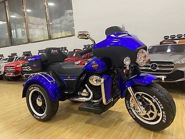 oyuncaq it: Yeni model uşaq elektrik motosikleti. üç təkərli akkumulyatorlu uşaq — 2