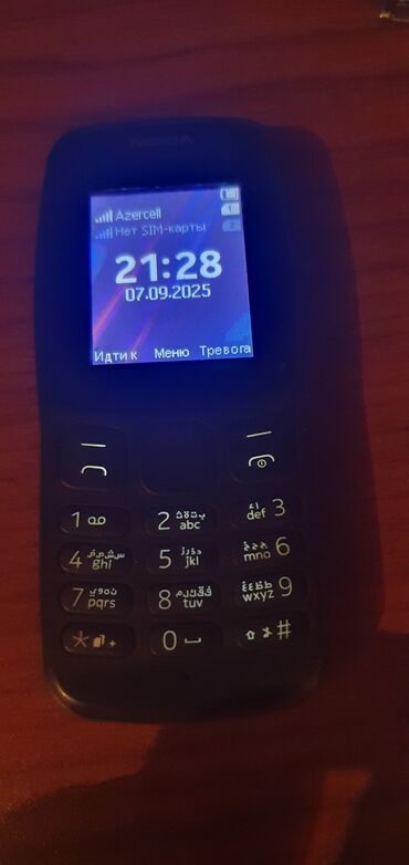 Foto və videokameralar: Nokia 106, rəng - Qara, Düyməli