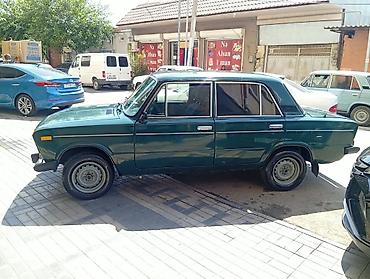 on suse: VAZ 2106 sedan – tünd yaşıl rəng - Kuzov: 4 qapılı, xrom yan — 2