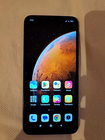 xiomi 9c: Redmi 9C, 128 GB, rəng - Mavi, Barmaq izi — 1
