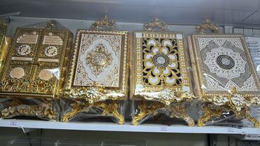 Dini kitablar: .Demir quran qablari 80 manatdan baslayir. Plastik quran qablâri 50 — 28