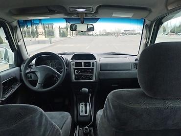 Mitsubishi Pajero iO 4WD kompakt yolsuzluq avtomobili. Avtomobilin at lalafo.az — 7 Mitsubishi Pajero iO 4WD kompakt yolsuzluq avtomobili. Avtomobilin — 7