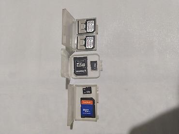 memory stick: Набор карт памяти и адаптеров: две микро флэшки оба по 2 Гб за каждую — 2