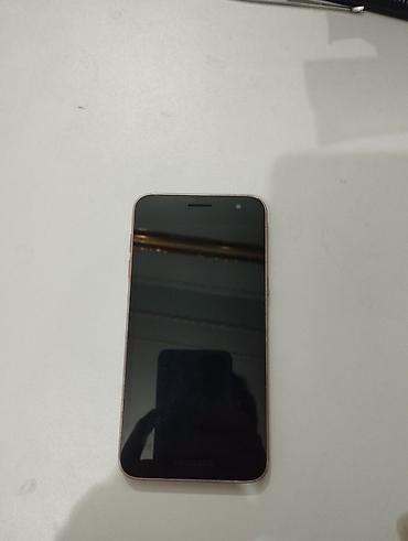 ses ucaldan: Samsung Galaxy J2 Core, 8 GB, rəng - Qızılı — 1