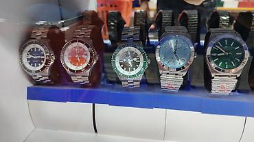 breitling: Kişi qol saatları – müxtəlif modellər və üslublar Məhsul təsviri: - — 9