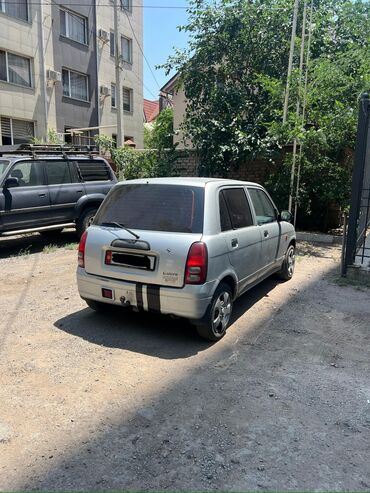corolla runx: Daihatsu Cuore: 2003 г., 1 л, Механика, Бензин, Хэтчбэк