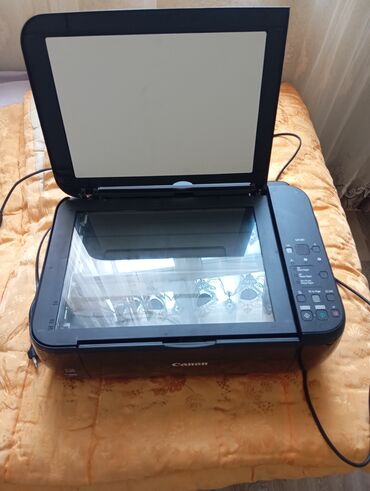 Printerlər: Printer Canon usdundə kağizinda verirem katrikleri yoxdubele işləyir