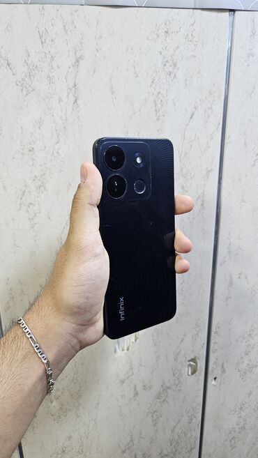 infinix smart 8 qiymeti: Infinix Smart 7, 64 ГБ, цвет - Черный, Гарантия, Кнопочный, Беспроводная зарядка