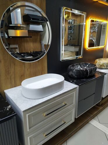 moydalar: Bu oval formalı ağ rəngli keramika lavabo, hamam otağına müasir və