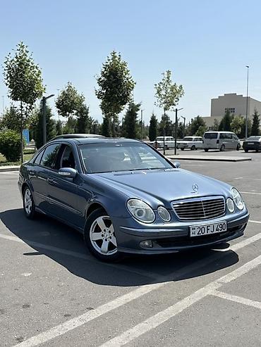 cls 63 amg: Mercedes-Benz E 200: 2 l | 2004 il Sedan — 7