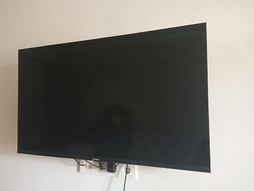 Телевизор Changhong, диагональ примерно 40–43". Плоская LED‑панель с