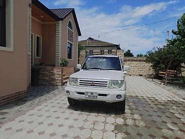7 nəfərlik avtomobillər: Mitsubishi Pajero: 1.8 l | 1998 il 350000 km Ofrouder/SUV — 1