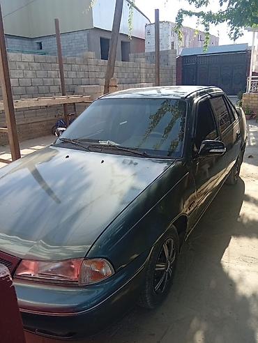 эшик б у: Daewoo Nexia: 1994 г., 1.5 л, Кол менен иштөөчү, Бензин, Седан — 2