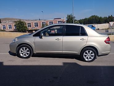 Nissan: Nissan Tiida: 1.6 l | Sedan — 13
