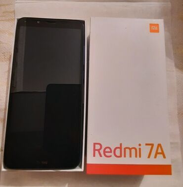 сотовый телефон fly ff249: Xiaomi Redmi 7, 32 ГБ, цвет - Синий, 
 Две SIM карты, С документами, Сенсорный