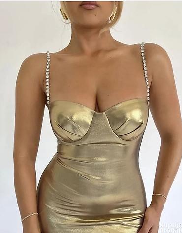 Haljine: 🔥Elegantna večernja haljina sa sjajnim efektom
✅1900 din — 1