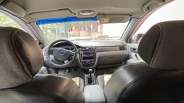 серый gac aion s: Daewoo Gentra: 2014 г., Механика, Газ, Седан — 3