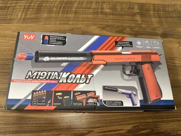 mutfaq oyuncaqları: YUY markalı M1911A Colt modelində olan oyuncaq tapança. Qutuda