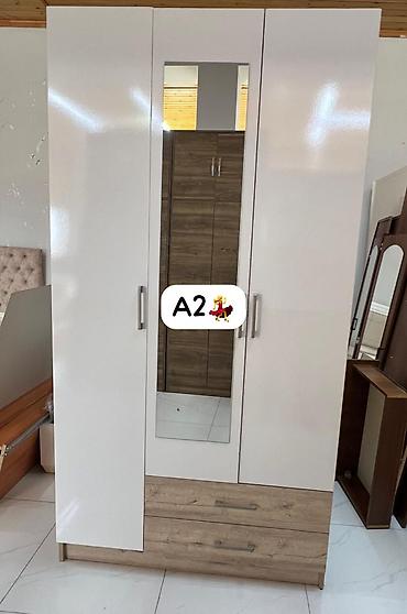 asılqan satılır: AYNUR 2💃 Dolab satılır Üç qapılı, güzgülü paltar dolabı. Ağ parlaq — 1