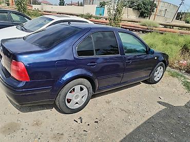 bora: Volkswagen Bora: 2 l | 2001 il Sedan — 2