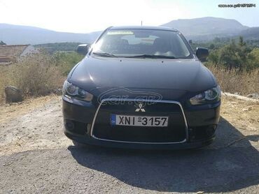 Mitsubishi Lancer: 1.5 l | 2010 year | 165000 km. Hatchback