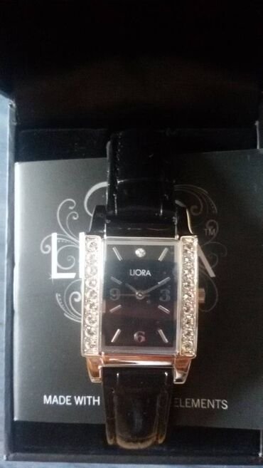 Watches: Rucni zenski sat sa cirkonima marke Liora. Baterija na satu mora da se