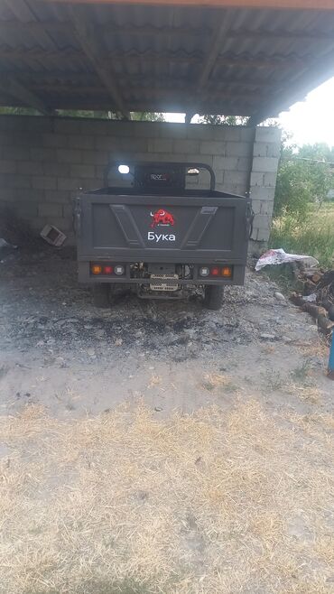 купить запчасти на опель вектра б: Грузовой мотоцикл марки "Бука" серого цвета с откидным кузовом