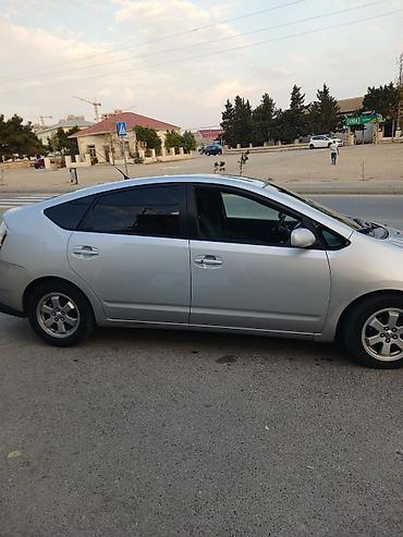 Toyota: Toyota Prius (2-ci nəsil) hibrid hetçbek - Gümüşü rəng, aerodinamik — 9