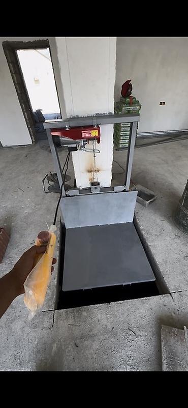 lövhə şəkilləri: Məhsul: Elektriklə işləyən mini yükgötürən/lift platforması — 2