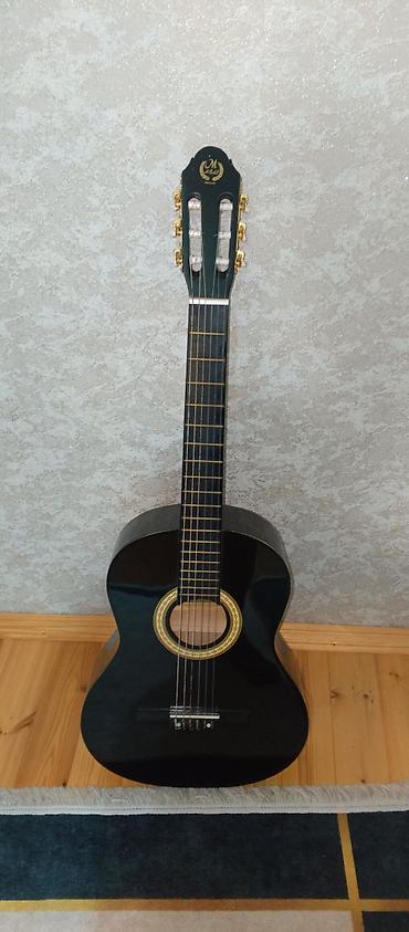 gitara klasik: Gitara satılır. Səliqəli istifadə olunub və ümumi vəziyyəti yaxşıdır — 1