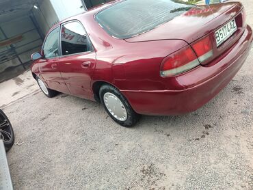 Mazda: Mazda 2: 1993 г., 2 л, Механика, Бензин, Седан