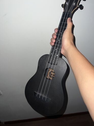 струна гитары: Модель:TUS-35E BK новая укулеле,в очень хорошем состоянии не