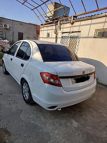 byd qin plus: Saipa Saina (sedan), ağ rəng. Masin Mastaga erazisinde yerlesir, tam — 5