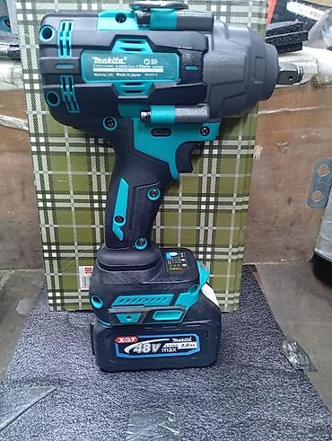 sds max: Аккумуляторный ударный гайковерт Makita XGT 48V 3.0Ah - Питание — 1