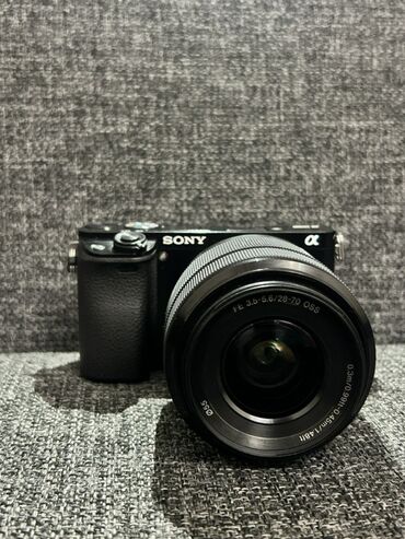 Fotokameralar: 16-50mm, 50mm 1.8 28-70mm lens 1. Sony A6000 kamera gövdəsi 2. Sony -da lalafo.az — 2 Fotokameralar: 16-50mm, 50mm 1.8 28-70mm lens 1. Sony A6000 kamera gövdəsi 2. Sony — 2