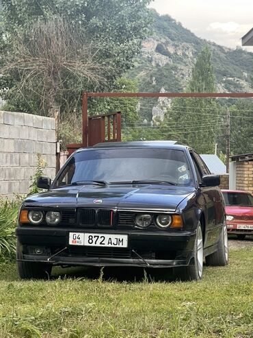 машина м5 ф90: BMW 5‑series E34, черный седан с доработками экстерьера. Особенности