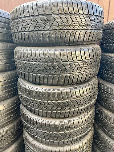 зимный сапок: Шины 215 / 55 / R 17, Всесезонная, Б/у, Комплект, Германия, Pirelli — 1