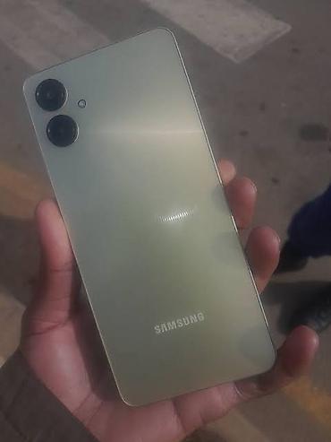 note 7 samsung: Samsung Galaxy A06, 128 GB, rəng - Yaşıl, Zəmanət — 2