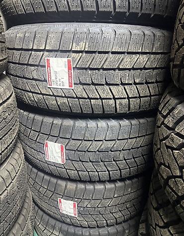 cadillac: Шины 285 / 45 / R 22, Зима, Новый, Комплект, Внедорожные (АТ/МТ), Япония, Bridgestone — 1